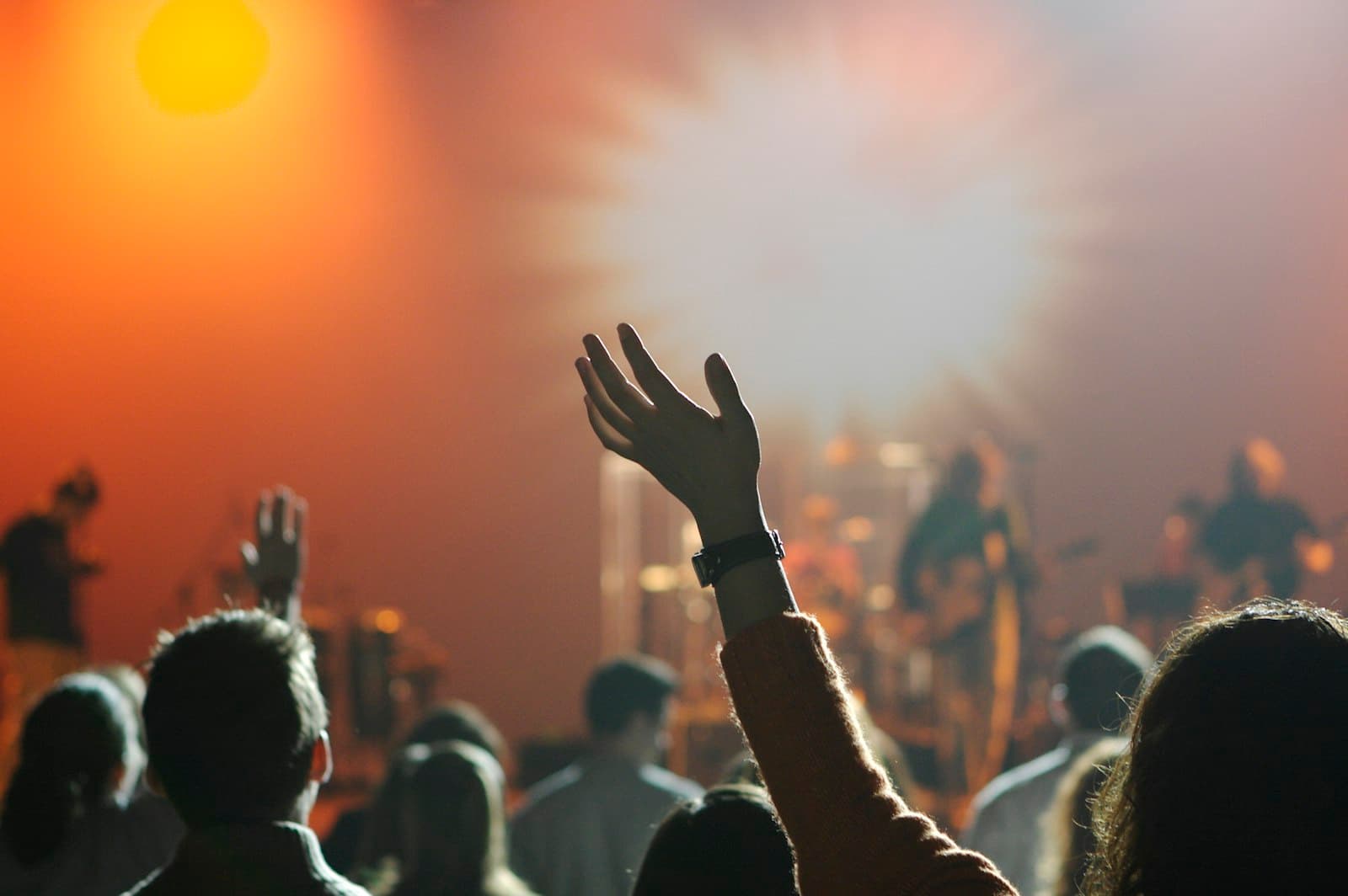 Hands joined in prayer during a church gathering